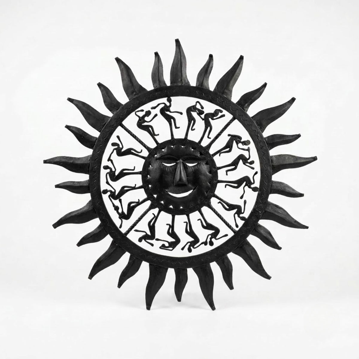 handcrafted bastar wrought iron sun face wall hanging – circular tribal motif