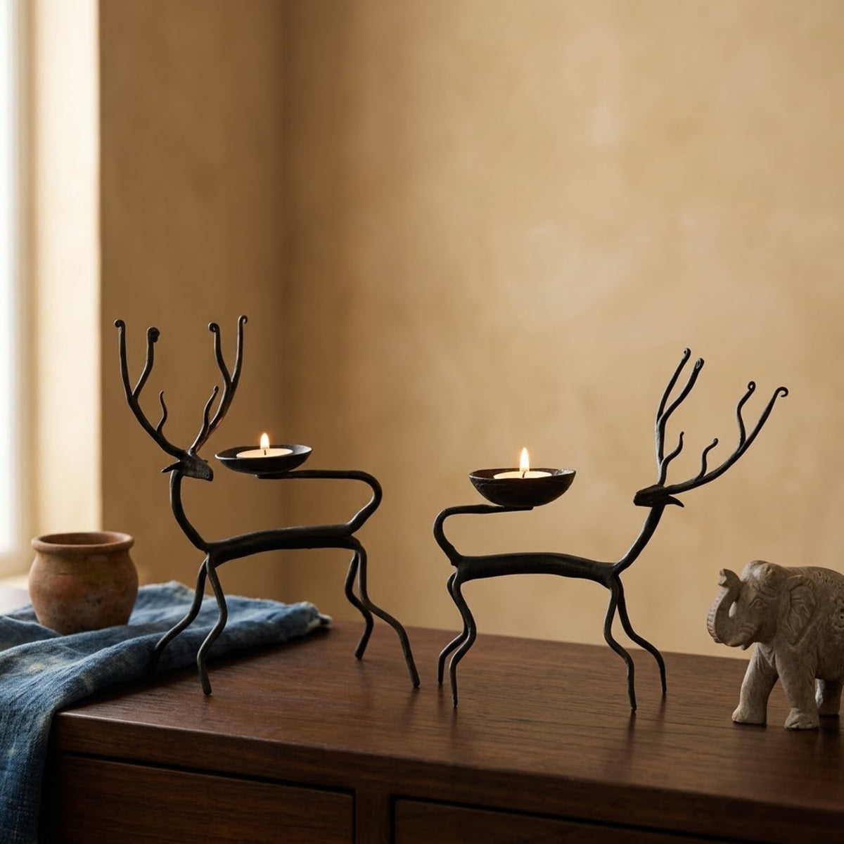 handcrafted bastar wrought iron tall curved antler deer candle holders (pair)
