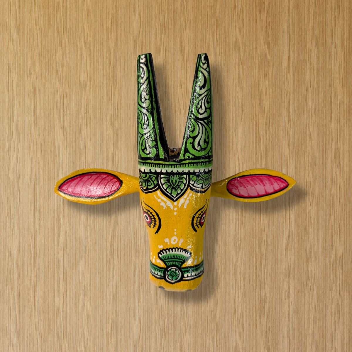 handcrafted wooden cow head wall hanging | traditional yellow & green odisha folk art accent