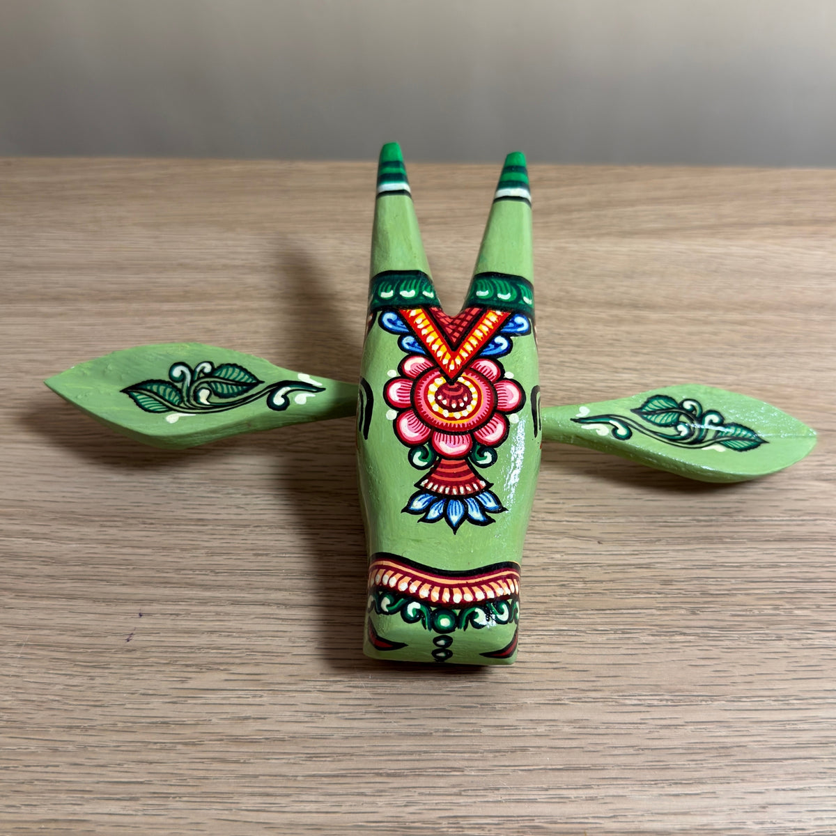 handcrafted wooden cow head wall hanging | olive green traditional odisha folk art accent