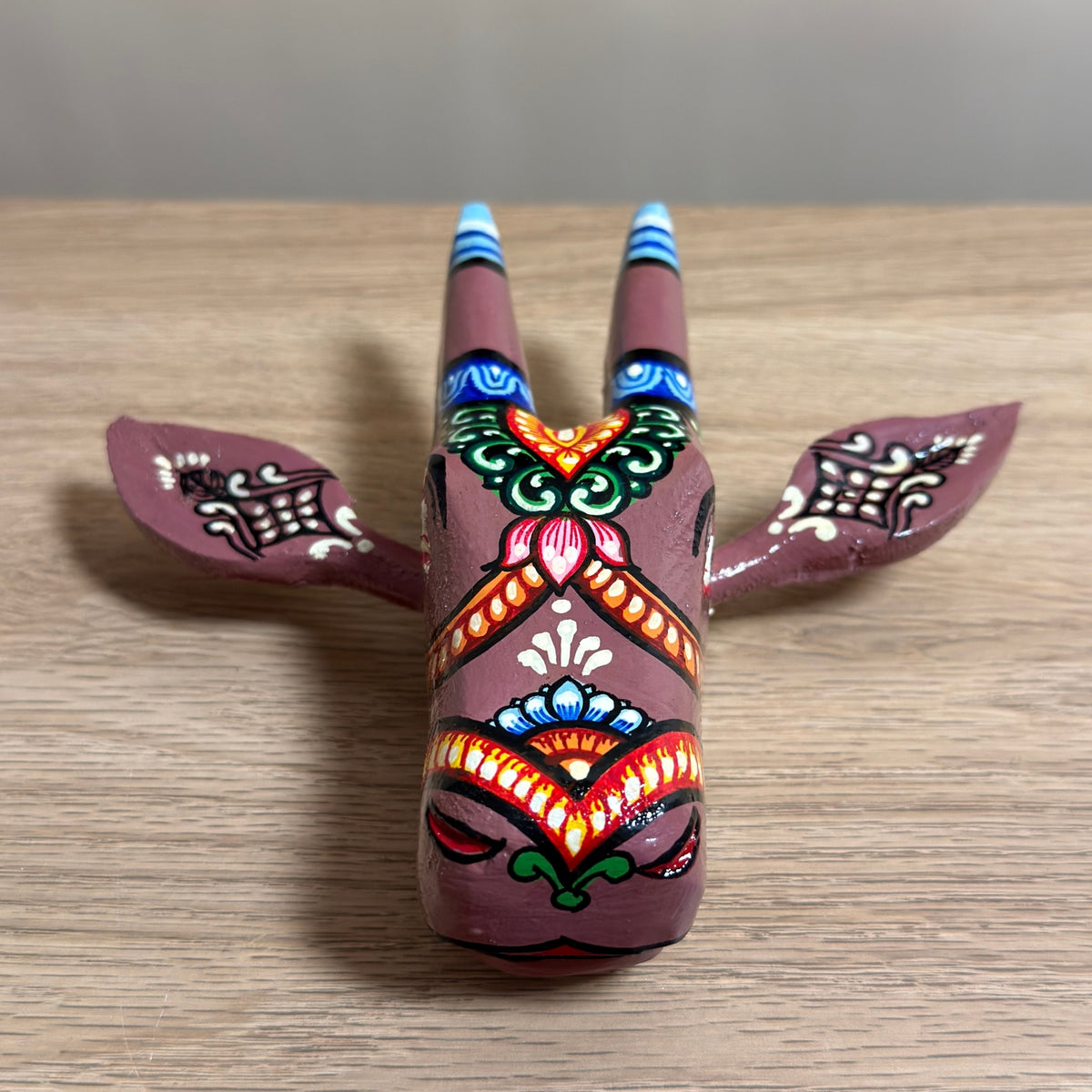 handcrafted wooden cow head wall hanging | mauve traditional odisha folk art accent