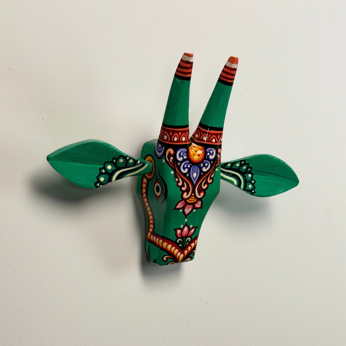 handcrafted wooden cow head wall hanging | emerald green traditional odisha folk art accent